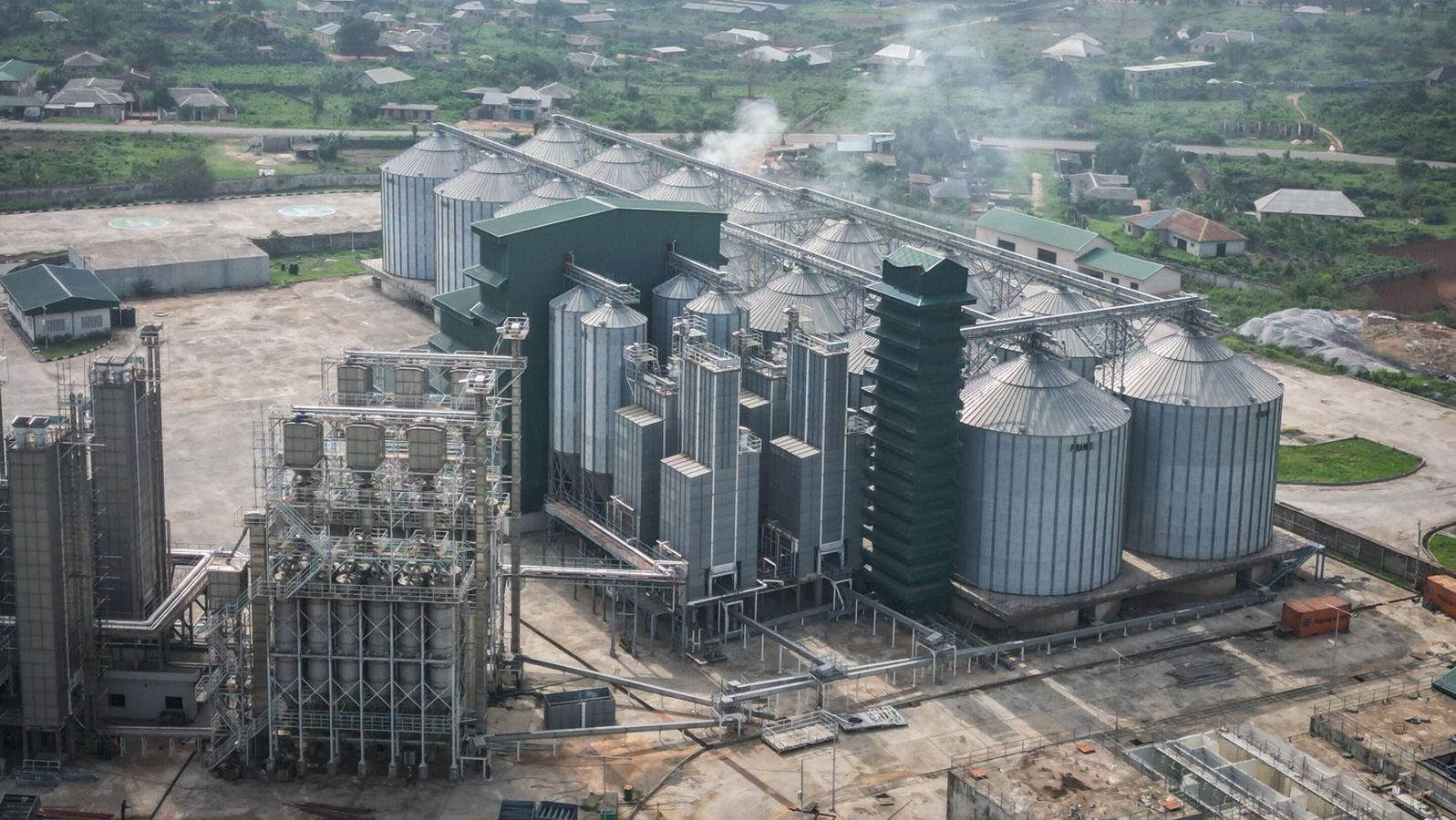 Rice processing facility with silos